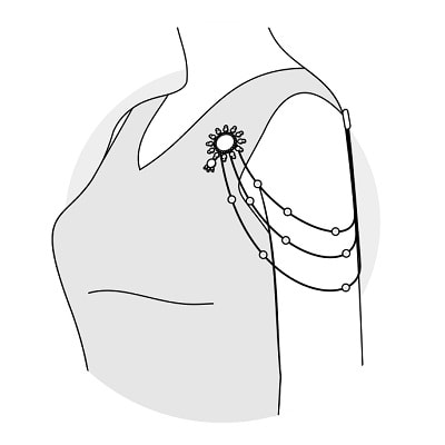 Brooche på skulderen